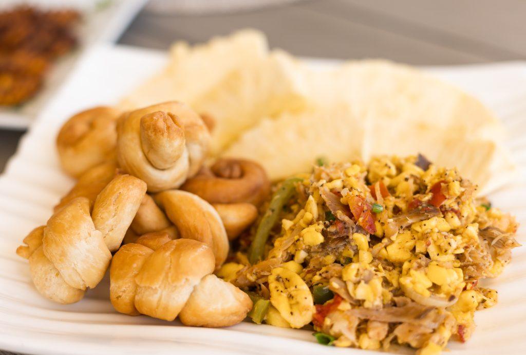 Traditional Jamaican ackee and saltfish with fried dumplings and boiled provision at Sea Salt Villa.