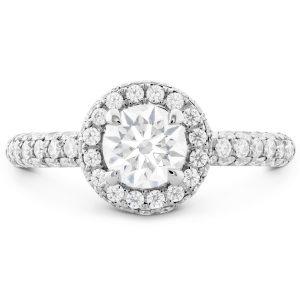 Diamond engagement ring with halo setting and pave band
