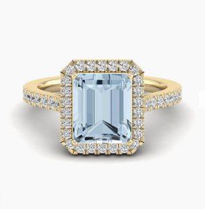 Aquamarine and diamond halo ring in gold from Milano jewellery in Ocho Rios Jamaica.
