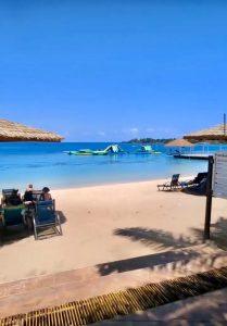 Beach cabanas and ocean view at Puerto Seco Beach in Discovery Bay, Jamaica.