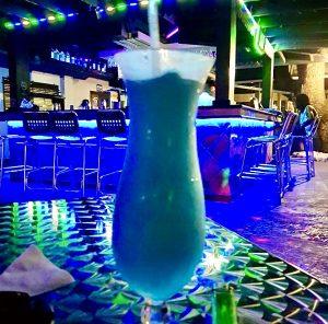 Blue tropical cocktail at Mongoose Jamaica bar in Ocho Rios.