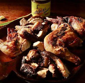 Authentic jerk chicken and jerk pork at Scotchies Drax Hall Jamaica.