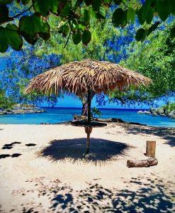 The Cove Beach with crystal-clear turquoise Caribbean water in Ocho Rios Jamaica.
